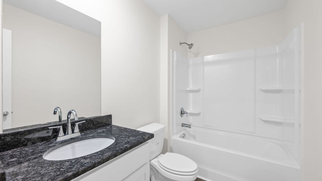 Representative furnished interior of a home built from the Freeport by D.R. Horton in Owensby Farms, Dayton (Image 4).