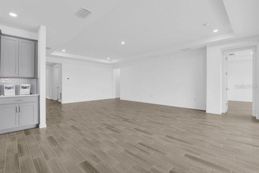 Furnished interior view inside a new home in Ardisia Park, New Smyrna Beach (Image 5).