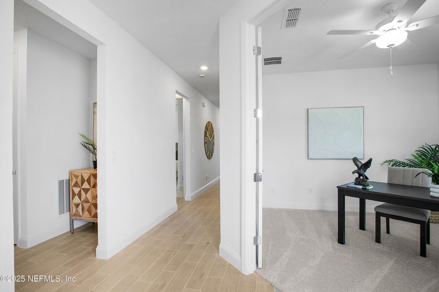 Furnished interior view inside a new home in Stillwater | Active Adult 55+: Stillwater (40s) - Royal Collection, St. Johns (Image 9). Furnished interior view inside a new home in Stillwater | Active Adult 55+: Stillwater (40s) - Royal Collection, St. Johns (Image 9).