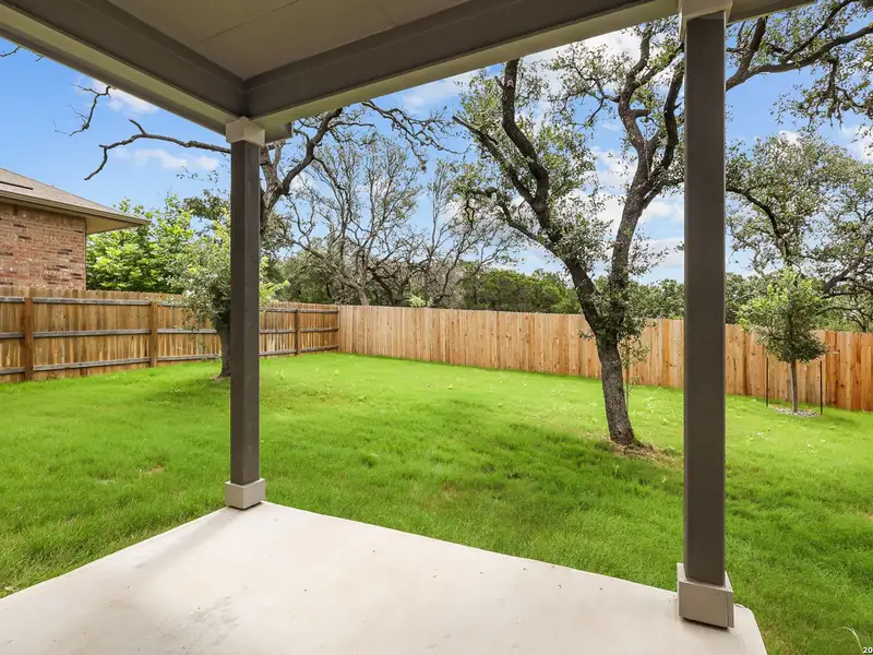 Exterior details and patio area of a home in Bricewood, San Antonio (Image 29).