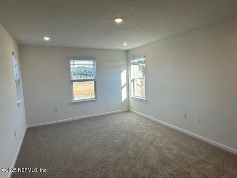 Spacious, unfurnished interior of a new home in Brook Forest - Villas, St. Augustine (Image 20).