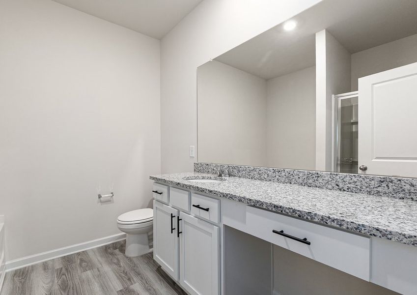 Get ready for your day in the master bathroom