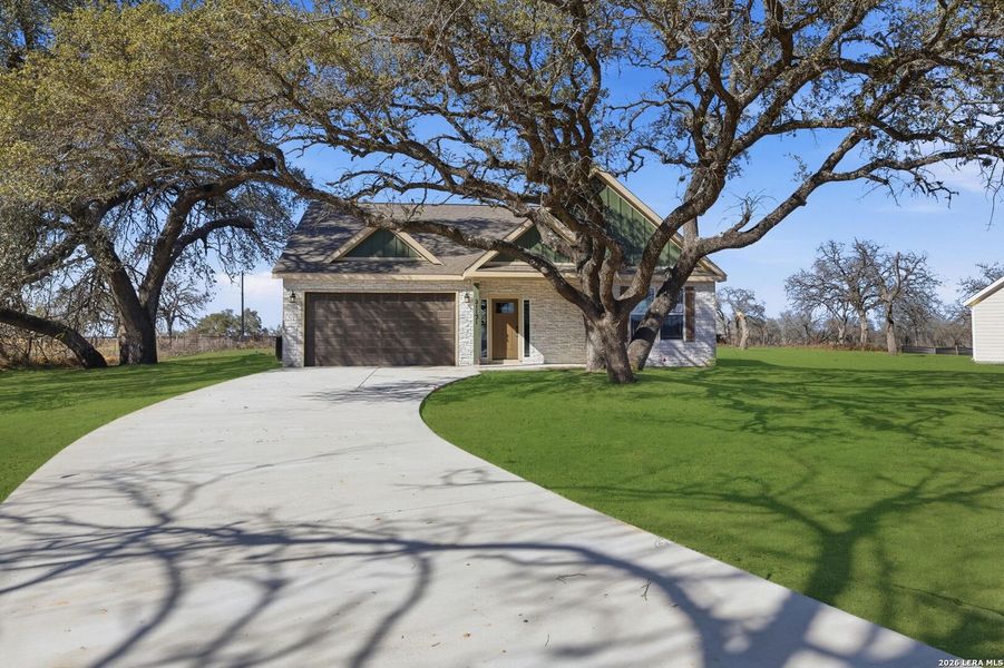Front exterior of a new home in Lonesome Dove, San Antonio, TX, highlighting curb appeal (Image 22).