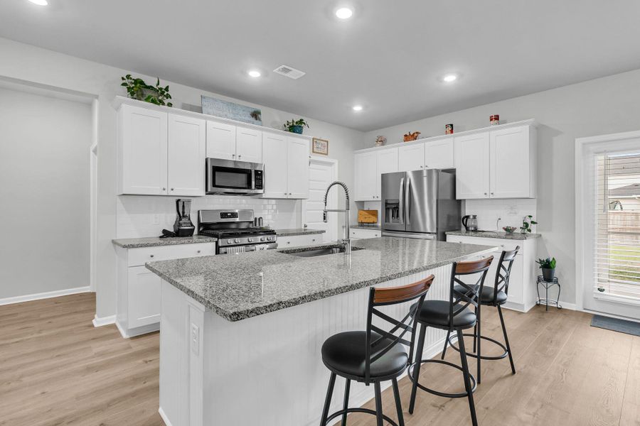 Furnished interior view inside a new home in Sweetgrass at Summers Corner, Summerville (Image 8).