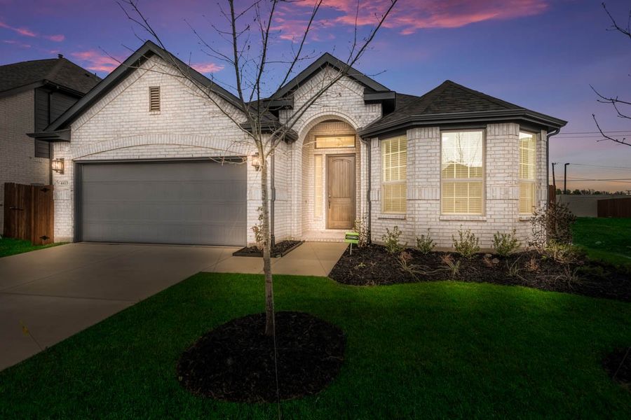 Front exterior of a new home in Las Lomas, Forney, TX, highlighting curb appeal (Image 19).