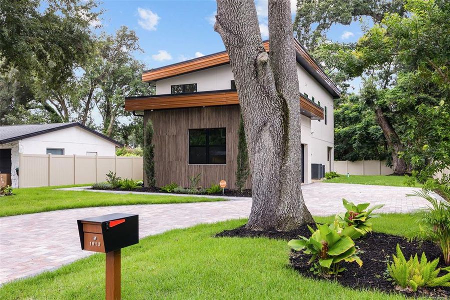 Front exterior of a new home in , Orlando, FL, highlighting curb appeal (Image 2).