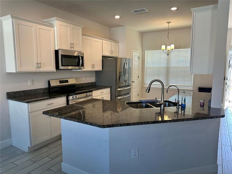 Furnished interior view inside a new home in Abbey Glen, Dade City (Image 14).