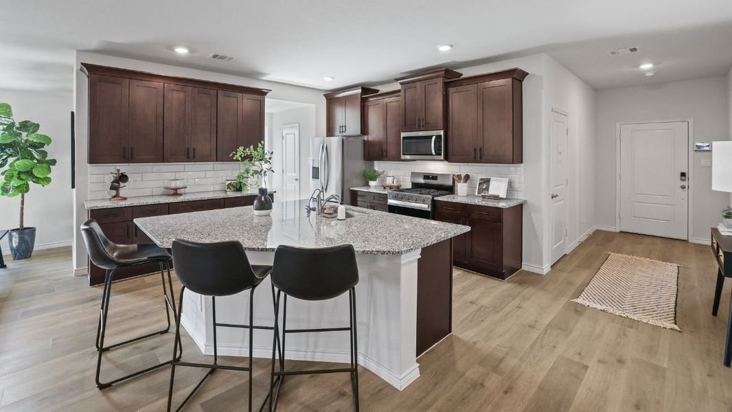 Furnished interior view inside a new home in Prairie Oaks, Oak Point (Image 4).