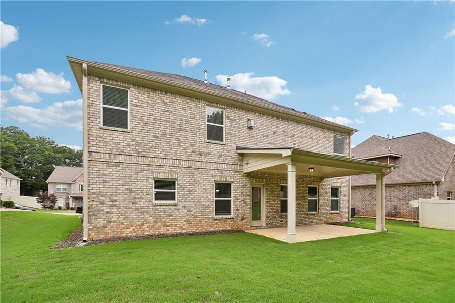 Exterior details and patio area of a home in , McDonough (Image 26).