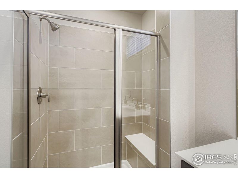 Walk in Shower with bench in Primary Bath (level 3) Walk in Shower with bench in Primary Bath (level 3)