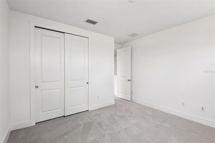 Spacious, unfurnished interior of a new home in Lagoon Residences at Epperson, Wesley Chapel (Image 18).