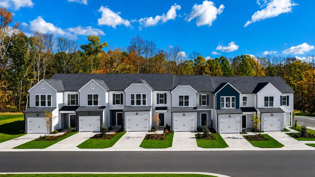 Front exterior of a new home in Flemingfield, Greensboro, NC, highlighting curb appeal (Image 24).