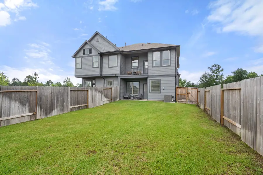 Exterior details and patio area of a home in Woodforest, Montgomery (Image 4). Exterior details and patio area of a home in Woodforest, Montgomery (Image 4).