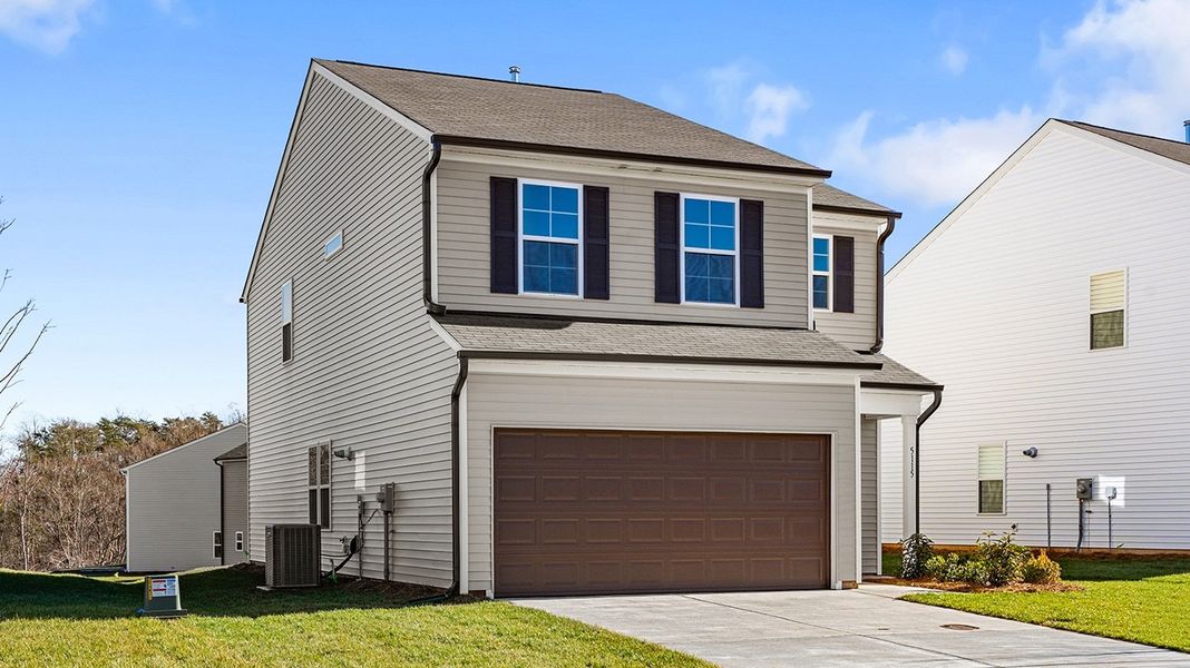 Front exterior of a new home in Bell West, Kernersville, NC, highlighting curb appeal (Image 20).