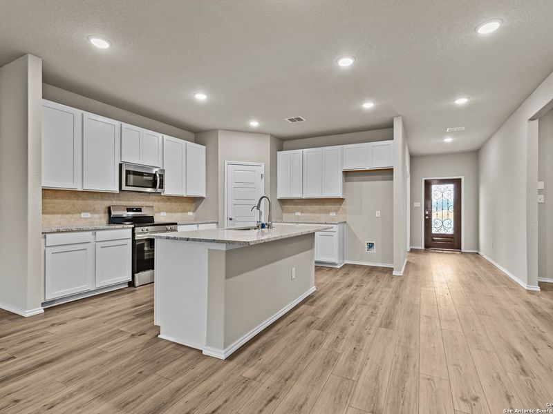 Furnished interior view inside a new home in Royal Crest, San Antonio (Image 5).