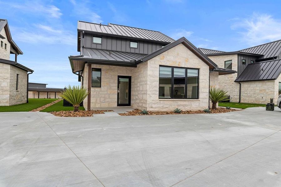 Front exterior of a new home in , Iredell, TX, highlighting curb appeal (Image 23).