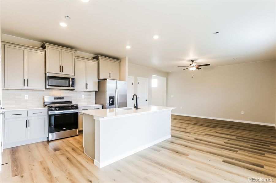 Furnished interior view inside a new home in Second Creek Farm, Commerce City (Image 4).
