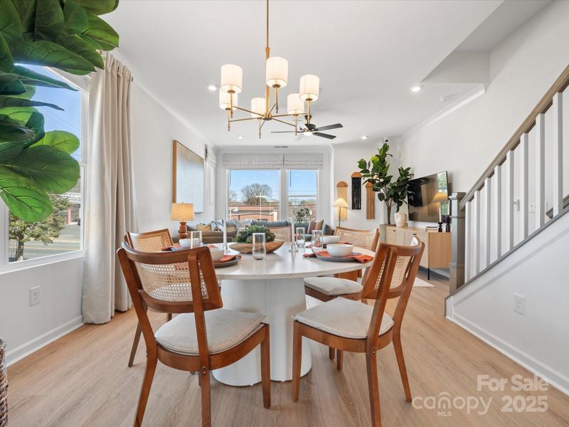 Dining Room Seamlessly Connecting Kitchen and Great Room. *Model Photos | Actual Finishes, Structural Selections, and Orientation May Vary. Dining Room Seamlessly Connecting Kitchen and Great Room. *Model Photos | Actual Finishes, Structural Selections, and Orientation May Vary.
