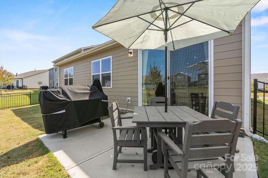 Exterior details and patio area of a home in Waxhaw Landing, Monroe (Image 23).