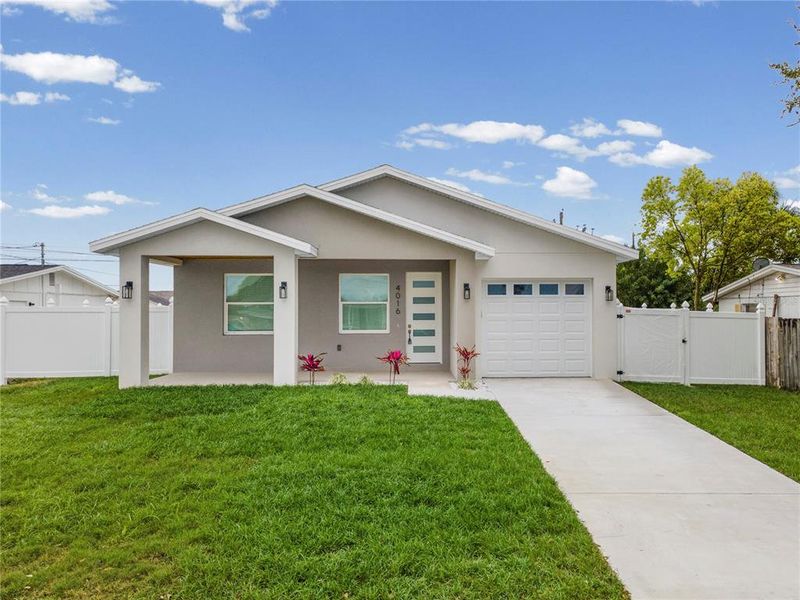 Front exterior of a new home in , Holiday, FL, highlighting curb appeal (Image 1). Front exterior of a new home in , Holiday, FL, highlighting curb appeal (Image 1).