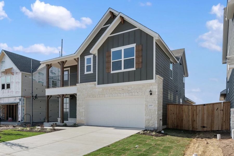 Front exterior of a new home in Patterson Ranch, Georgetown, TX, highlighting curb appeal (Image 25).