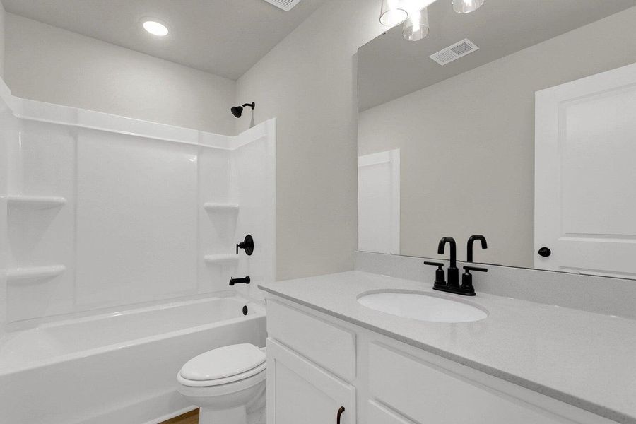 Furnished interior view inside a new home in Tea Farm: Presidents Series, Ravenel (Image 14).