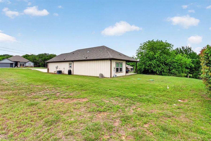 Exterior details and patio area of a home in , Granbury (Image 20).