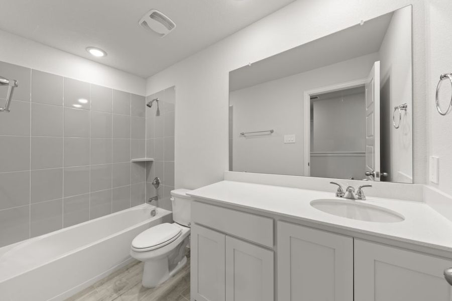 Front exterior of a new home in Sereno Oaks at Buckner Terrace, Dallas, TX, highlighting curb appeal (Image 18). Front exterior of a new home in Sereno Oaks at Buckner Terrace, Dallas, TX, highlighting curb appeal (Image 18).