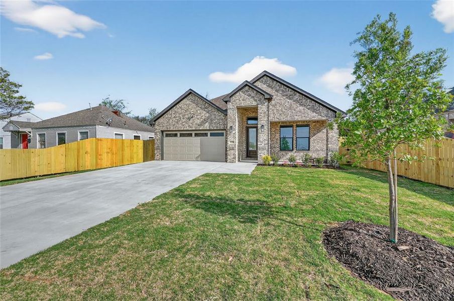Front exterior of a new home in , Grand Prairie, TX, highlighting curb appeal (Image 18).