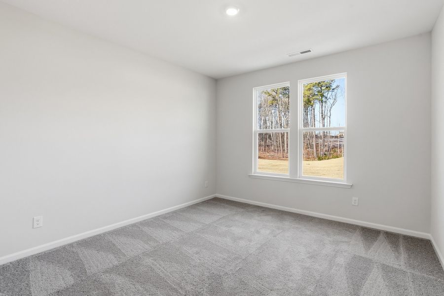 Spacious, unfurnished interior of a new home in Ovation at Sweetbrier, Durham (Image 22).