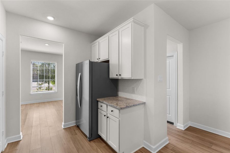 Well-appointed kitchen with granite countertops, stainless steel appliances, generous cabinetry, and a functional open layout. Designed for both everyday convenience and effortless entertaining Well-appointed kitchen with granite countertops, stainless steel appliances, generous cabinetry, and a functional open layout. Designed for both everyday convenience and effortless entertaining