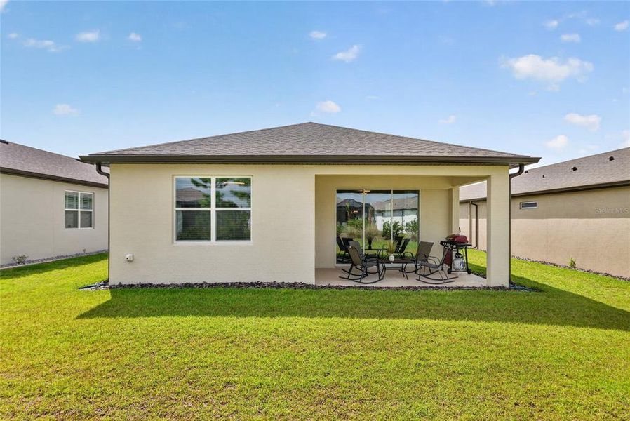 Exterior details and patio area of a home in Del Webb Stone Creek, Ocala (Image 30).