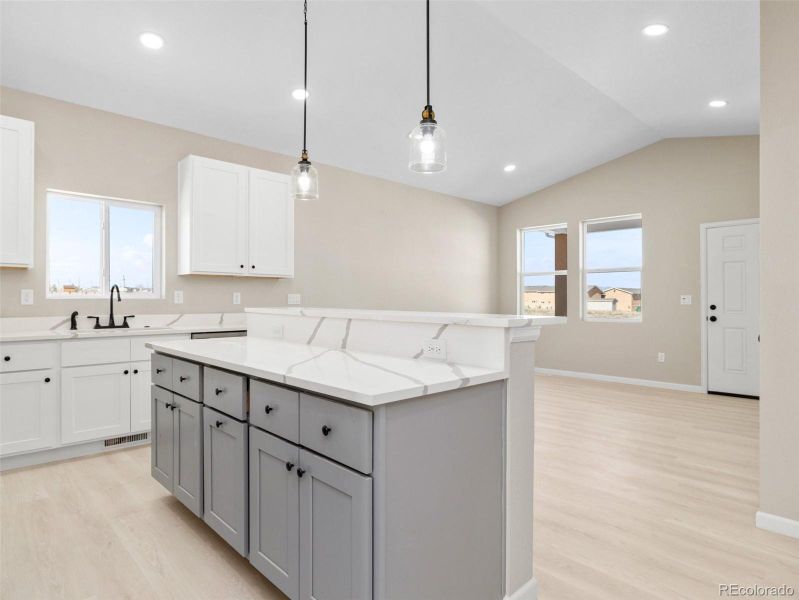 Gourmet kitchen with quartz counter tops and stainless appliances Gourmet kitchen with quartz counter tops and stainless appliances