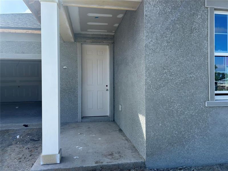 Exterior details and patio area of a home in Oakfield Trails, Parrish (Image 3).