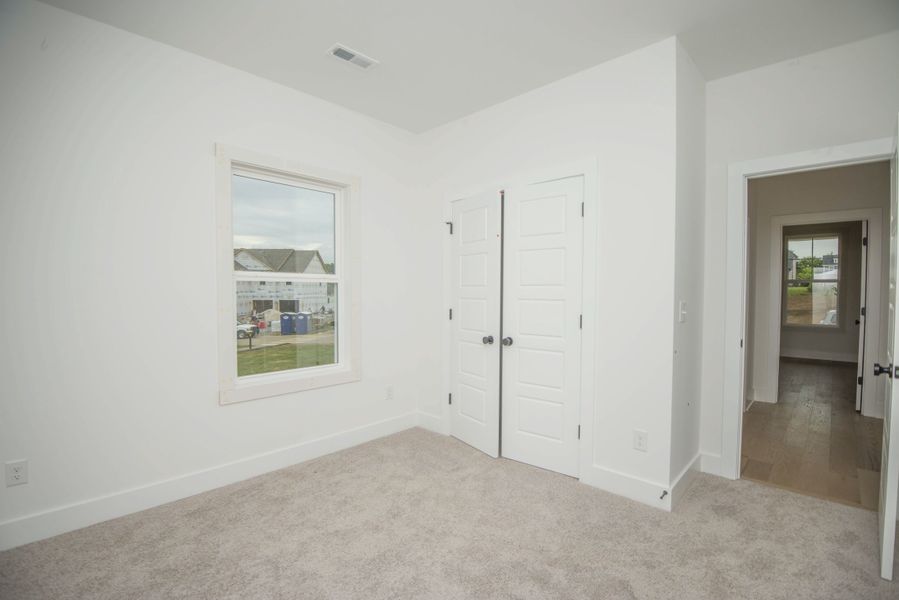 *Photo of example home. Selections and Finishes May Vary.*