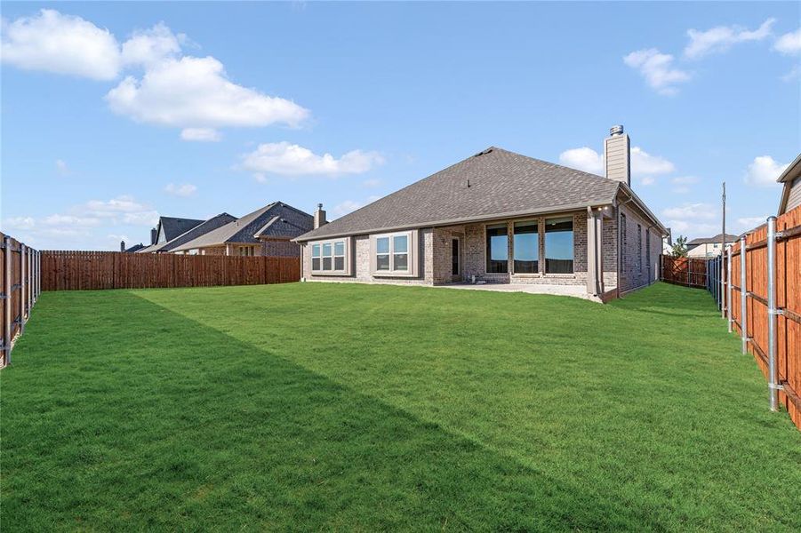Exterior details and patio area of a home in Villages of Walnut Grove, Midlothian (Image 24).