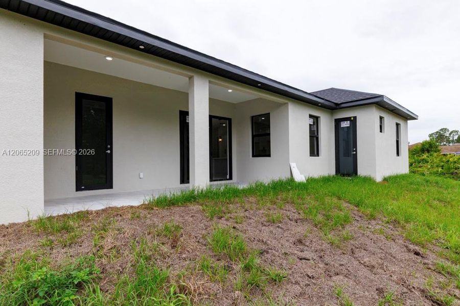 Exterior details and patio area of a home in , Lehigh Acres (Image 32).
