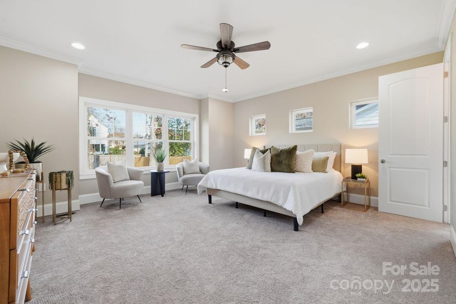 Primary suite with oversized window wall — beautifully bright and inviting. Primary suite with oversized window wall — beautifully bright and inviting.