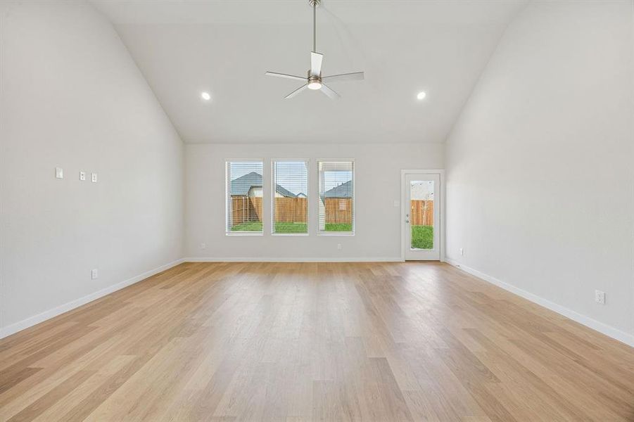 Living and Dining Room in the Stanley II home plan by Trophy Signature Homes – REPRESENTATIVE PHO