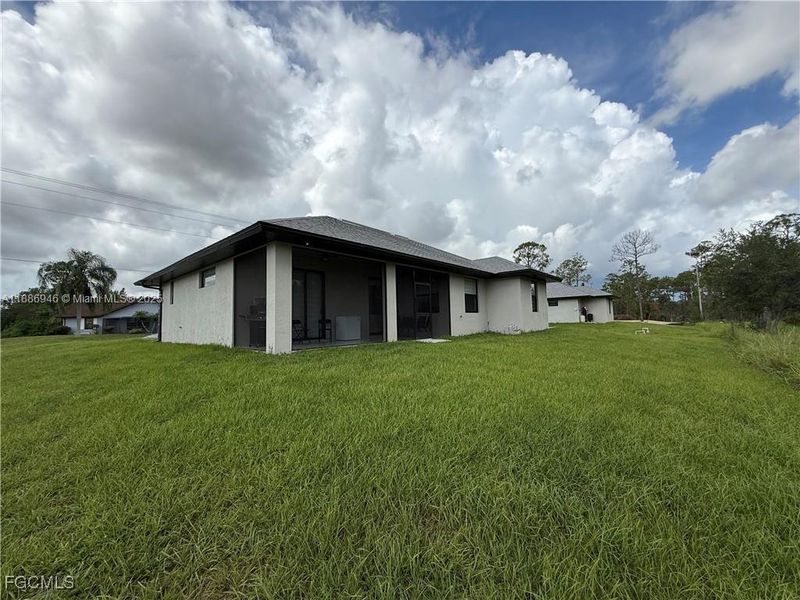Exterior details and patio area of a home in , Lehigh Acres (Image 2).