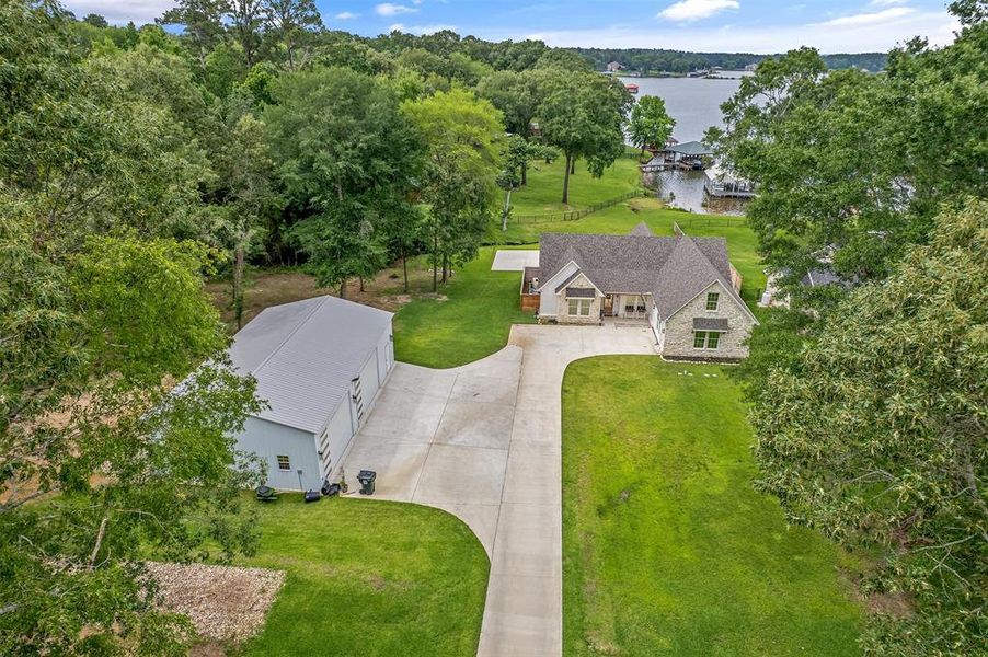 Front exterior of a new home in , Tyler, TX, highlighting curb appeal (Image 20).