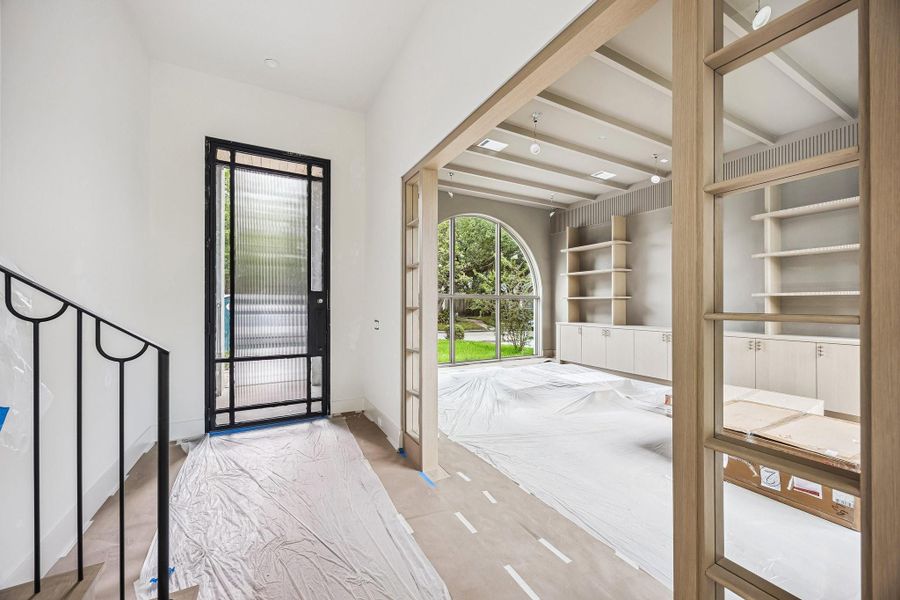 Entrance of the home with a Steel front door, with Reeded Glass.  Construction as of June 1st, 2026.