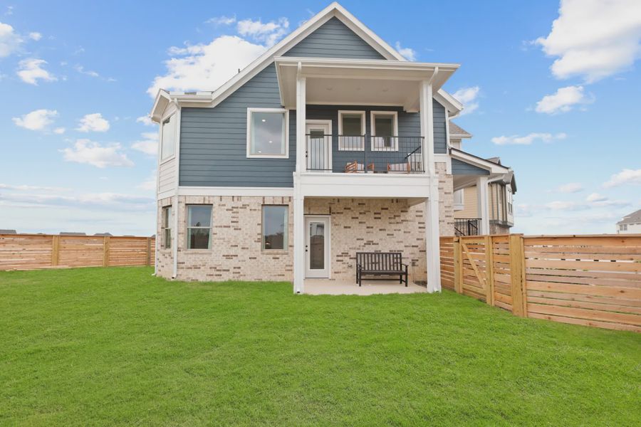 Representative exterior details of a home built from the Oakdale by Chesmar Homes in Bridgeland, Elgin (Image 26).