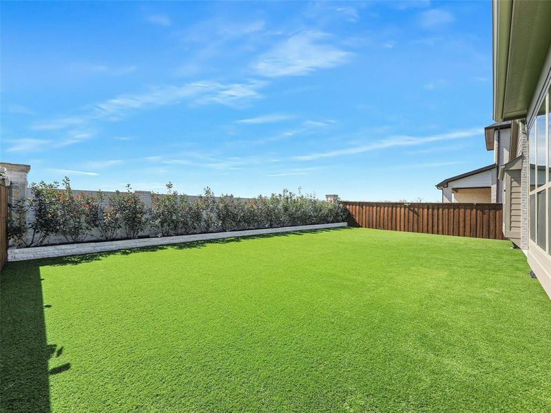 Fully Fenced Backyard
Landscaped