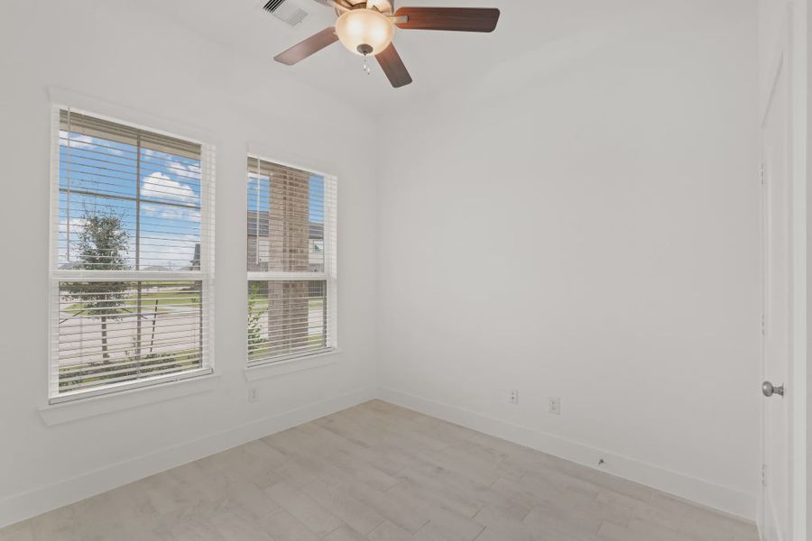 Representative unfurnished interior of a home built from the Fairway by Chesmar Homes in Riceland Alley Loads, Mont Belvieu (Image 10).