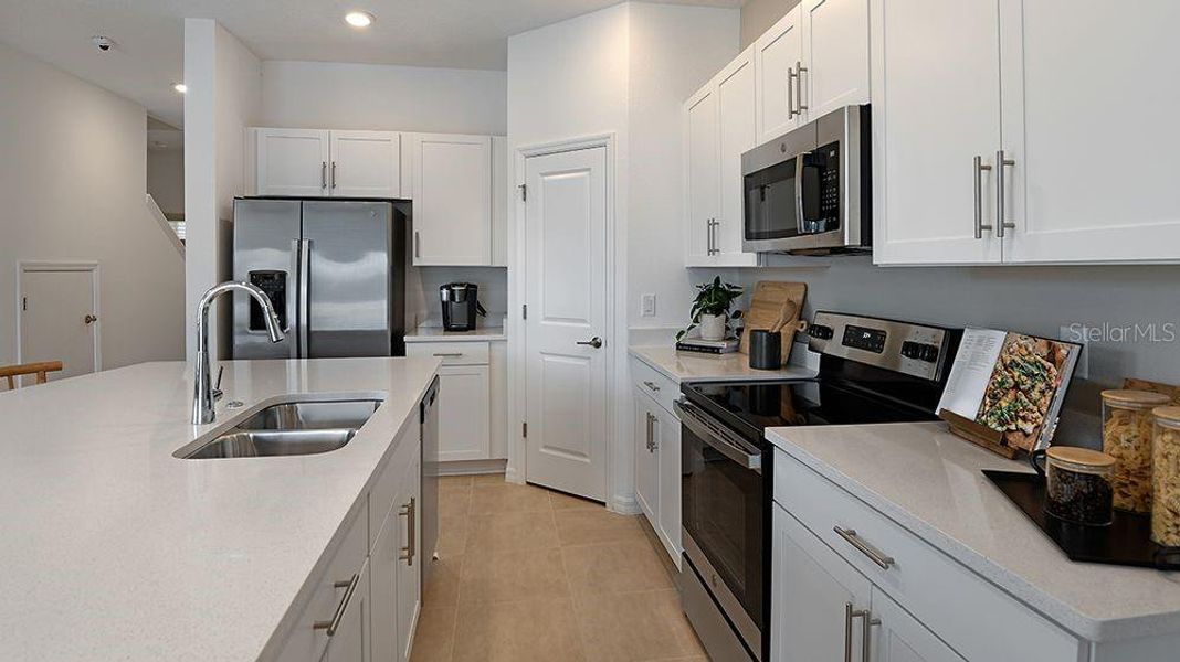 Furnished interior view inside a new home in Vinterra Townhomes, Nokomis (Image 5).