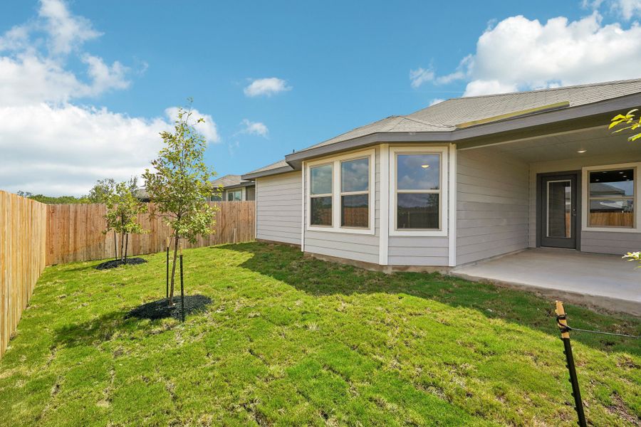 The back exterior of the Allen floorplan at a Meritage Homes community.