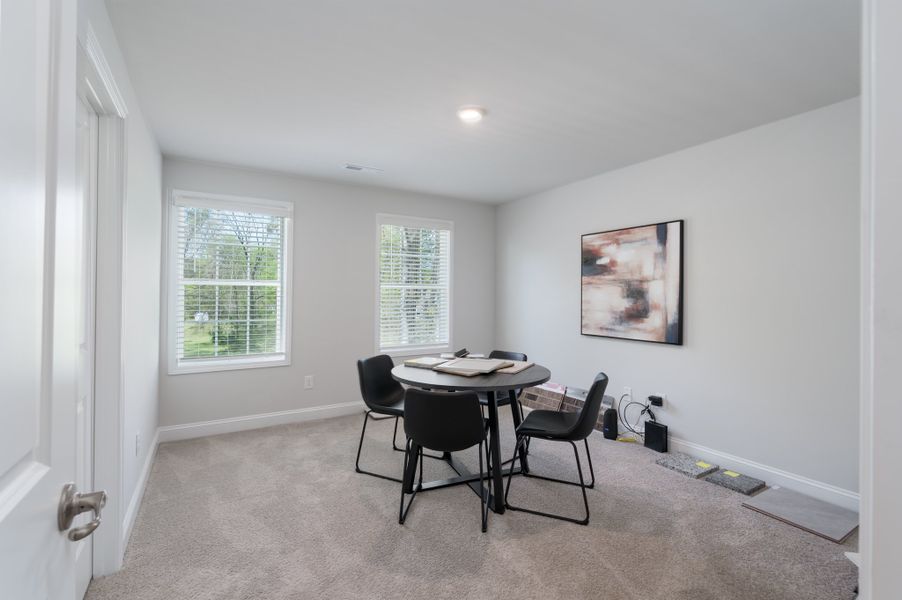Representative furnished interior of a home built from the 3320 by Adams Homes in Norris Landing, Snellville (Image 36).