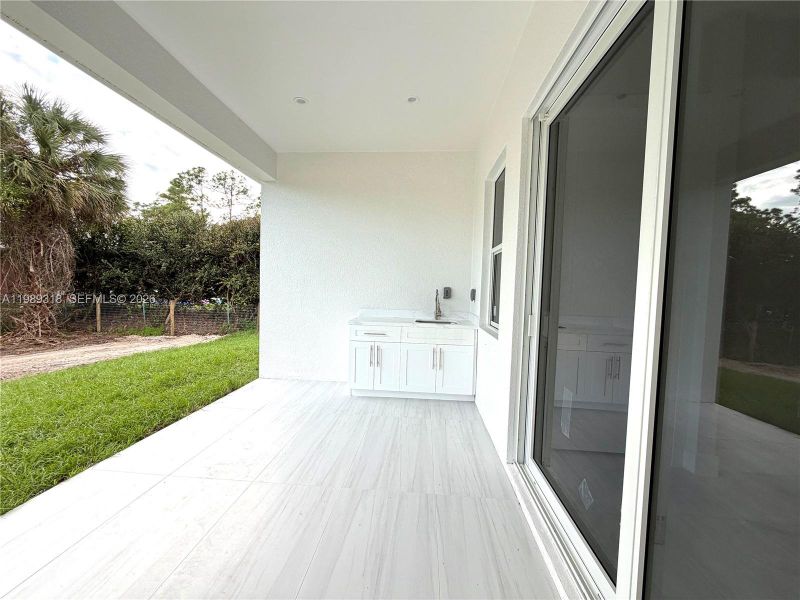 Exterior details and patio area of a home in , Naples (Image 16). Exterior details and patio area of a home in , Naples (Image 16).