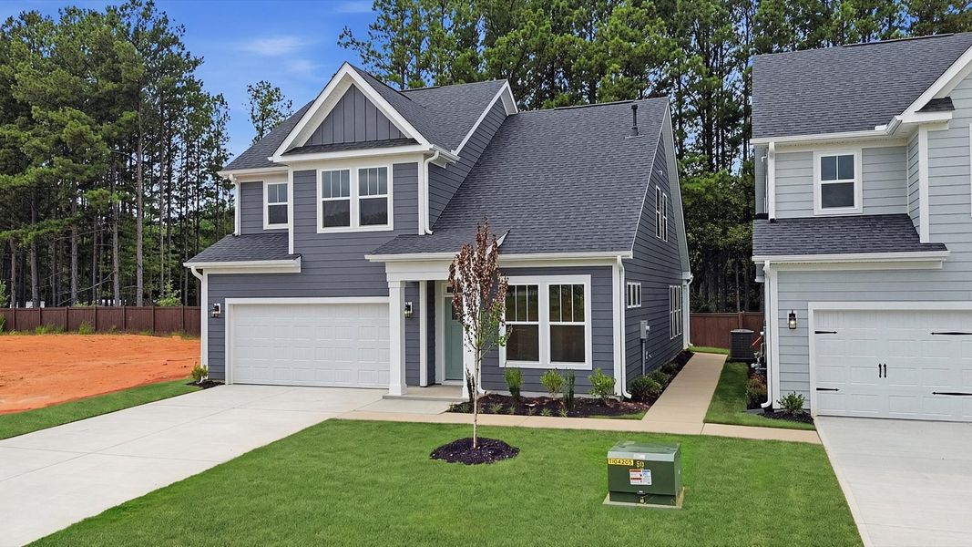Front exterior of a new home in Barton Hollow Single Family Homes, Fountain Inn, SC, highlighting curb appeal (Image 22). Front exterior of a new home in Barton Hollow Single Family Homes, Fountain Inn, SC, highlighting curb appeal (Image 22).